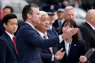 Pete Hegseth, US Secretary of Defense, and Japan Minister Gen. Nakatani responds after reviewing an guest of honor during a welcome ceremony at the Tokyo Ministry of Defense in Tokyo